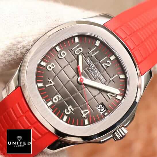 Patek Philippe Red 5167A Replica 1 Patek Philippe Geneve Brown Dial Red Rubber Bracelet Replica on the hand