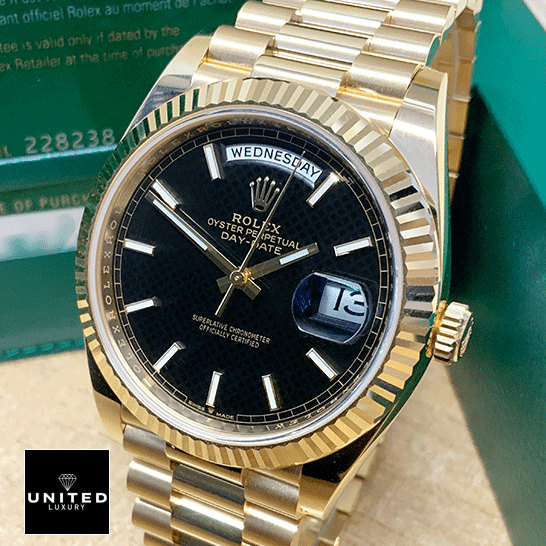Rolex Day-Date Gold Black 228235 EW Replica 2 Rolex Day-Date 228235 Replica beside the Rolex Box