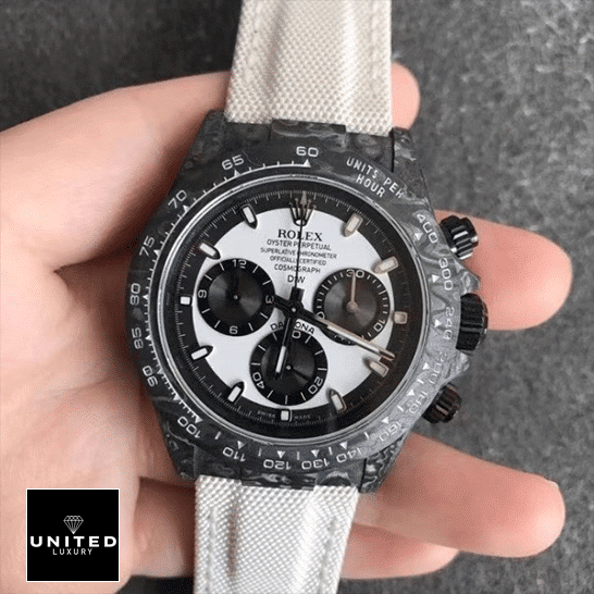 Rolex Daytona Carbon Cosmograph Cream Dial 4130CR Replica 4 Rolex Daytona Carbon Cream Textile Bracelet Black Bezel Replica on his hands
