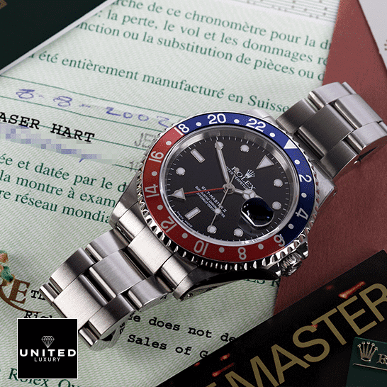 Rolex GMT-Master 116719BLRO-0001 Pepsi Red/Blue Replica 1 Rolex GMT-Master Pepsi 116719BLRO-0001 Replica on the table